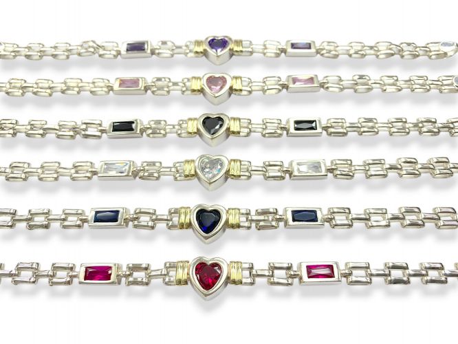 <p>Pulsera de Plata y Oro Centro Corazón</p>
