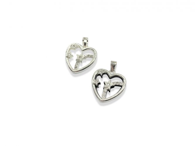 <p>Dije de Acero Blanco</p>

<p>Corazón Blanco y Negro</p>
