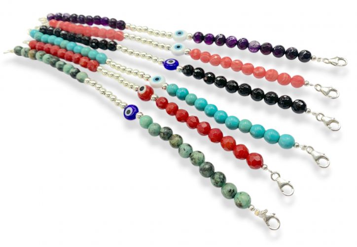 <p>Pulsera de Plata con Piedras y Ojos</p>
