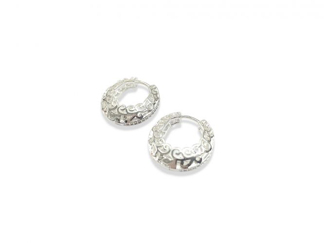 <p>Argollas de Aceroo Blanco</p>

<p>Caladas con Centro Cubic</p>
