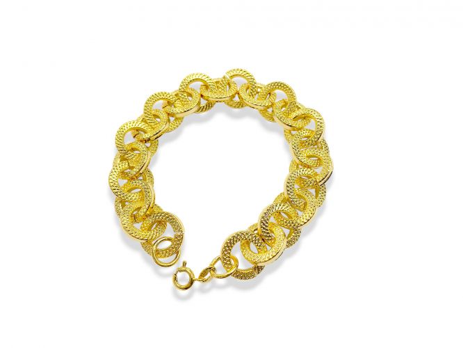 <p>Pulsera Gruesa de Goldfilled con Eslabones Trabajados</p>
